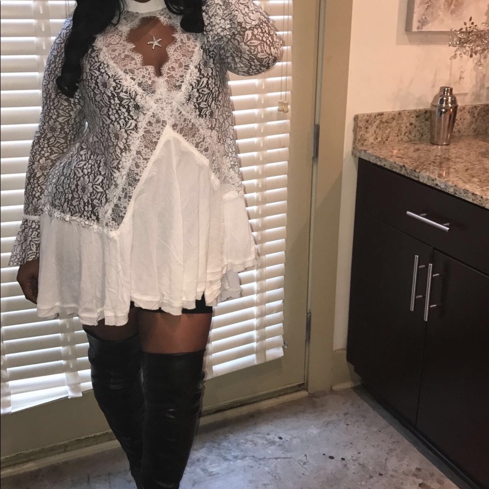White with black outlined flowers, free people
